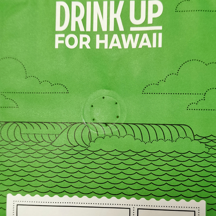 Close view of a valve within green illustrated bag artwork