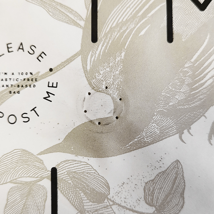 Close view of a valve within pale botanical artwork