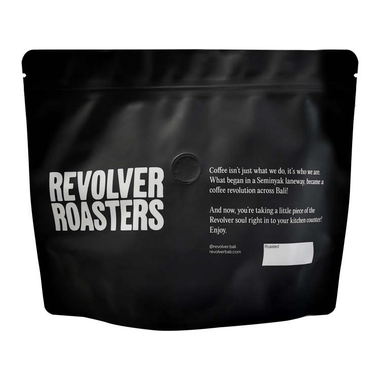 Back of a black coffee pouch with a white printed information panel