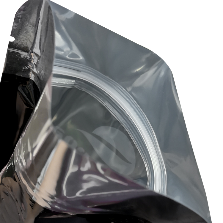 Open glossy coffee bag showing its inner closure area