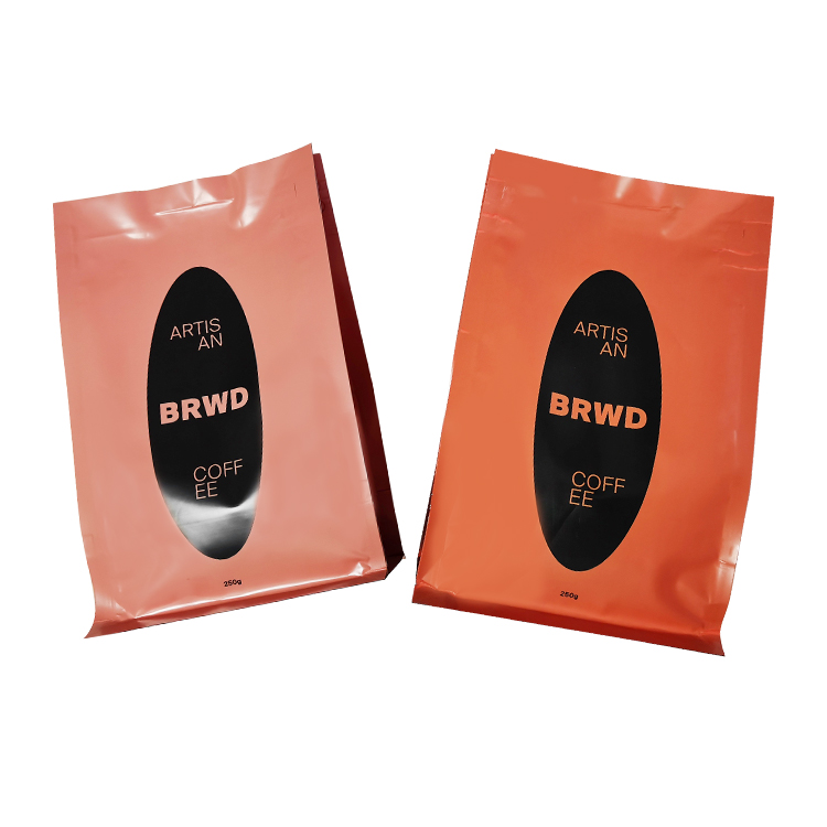 Angled peach and orange flat bottom coffee bags