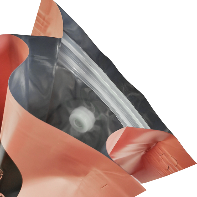 Open coffee bag showing its interior valve and closure