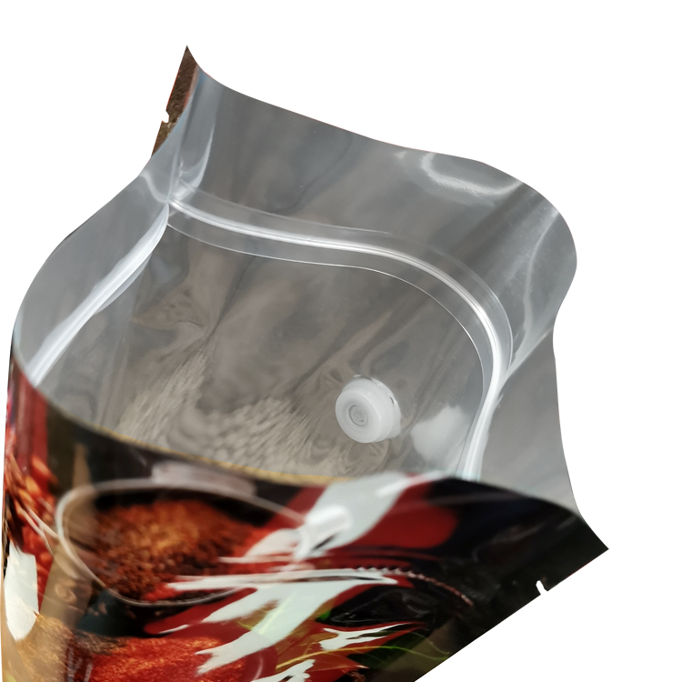 Open printed pouch showing its interior closure and valve