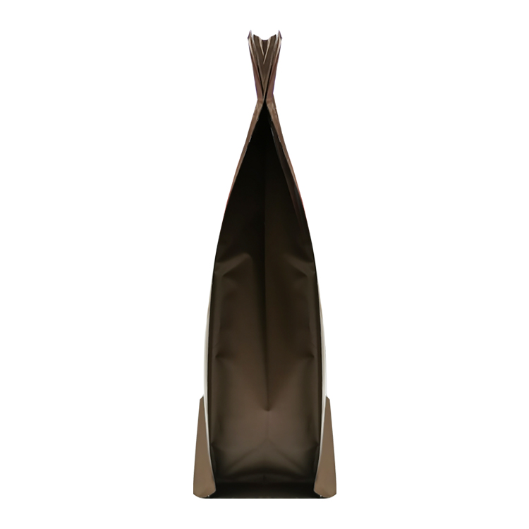 Narrow side view of a dark brown flat bottom coffee bag