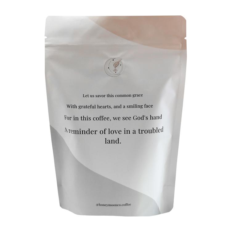 Back panel of a matte stand-up coffee pouch showing a printed text layout