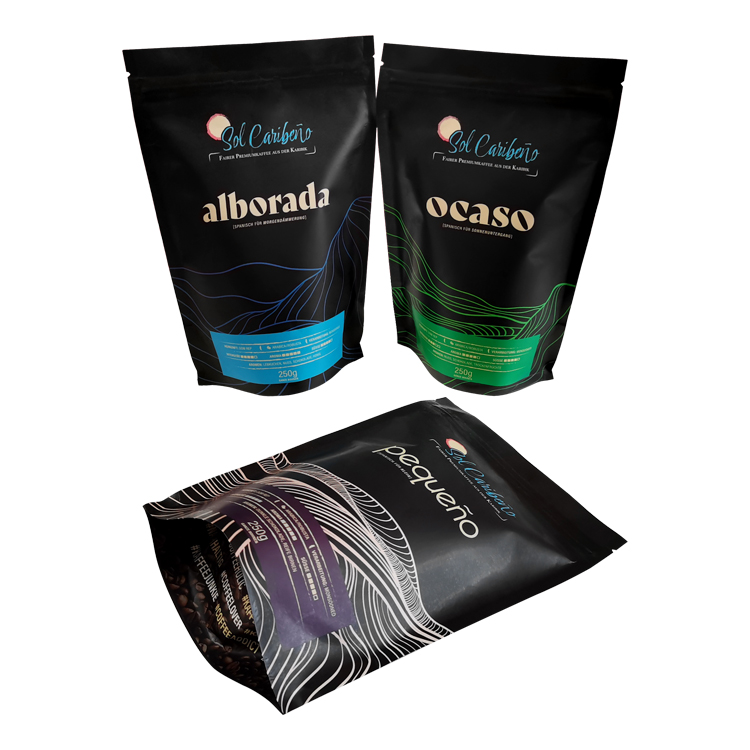 Two upright dark pouches beside a laid-down purple-accent version