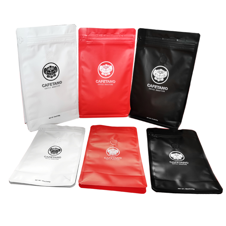 Three upright and three laid-down colored coffee bag fronts