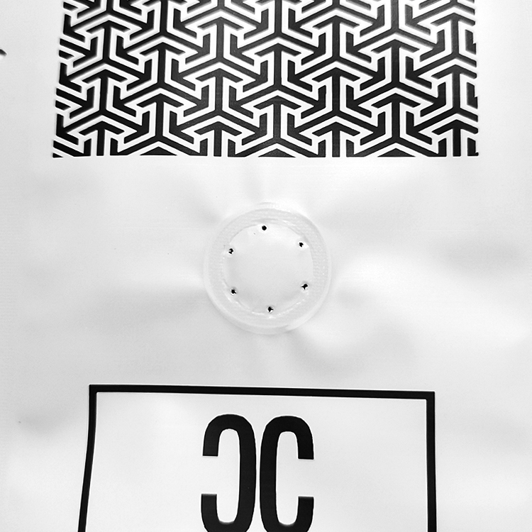 Close view of the front valve below a black geometric pattern