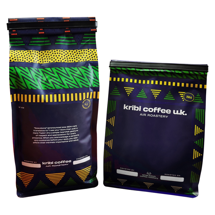 Two black coffee bag views with bright patterned top panels