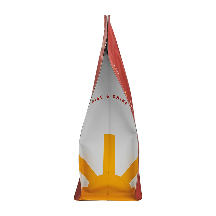 Side view of the white and yellow gusset beside red bag faces