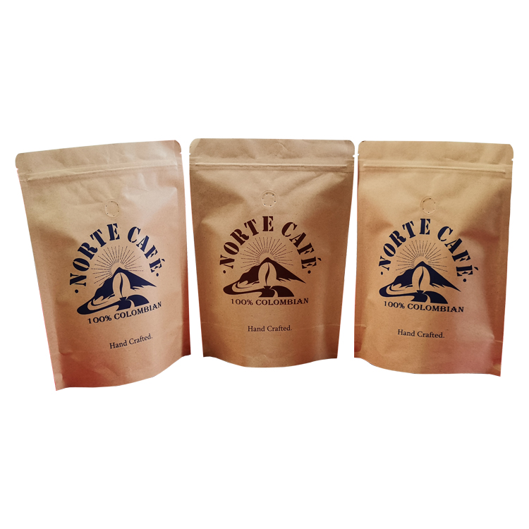 Three brown-colored stand up coffee pouches with illustrated labels