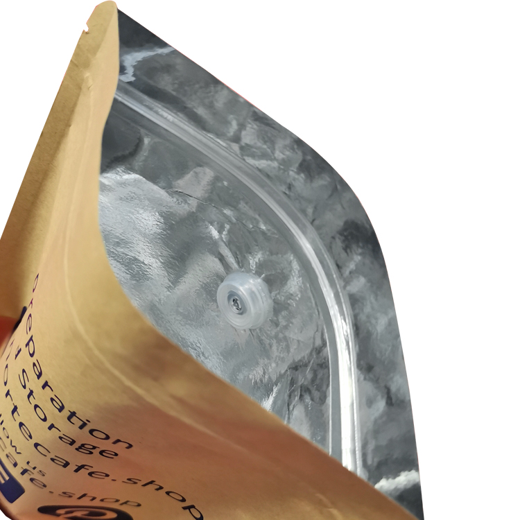 Open kraft-colored pouch showing its interior and valve