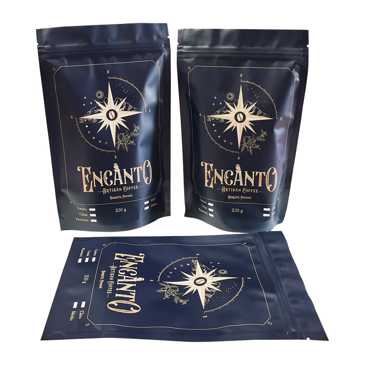Two upright dark blue pouches beside a laid-down matching design