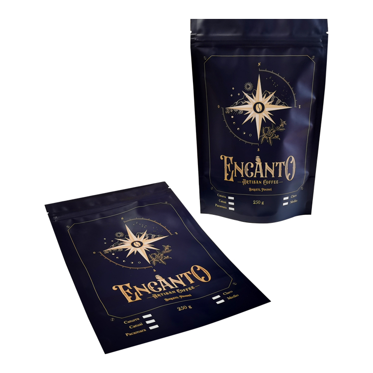 Upright and laid-down dark blue compass-design coffee pouches