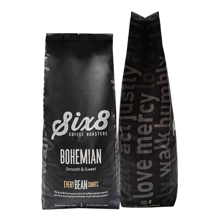 Dark coffee bag front beside a narrow side with large text