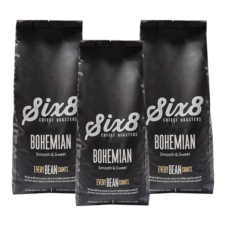 Three dark coffee bags with matching front lettering