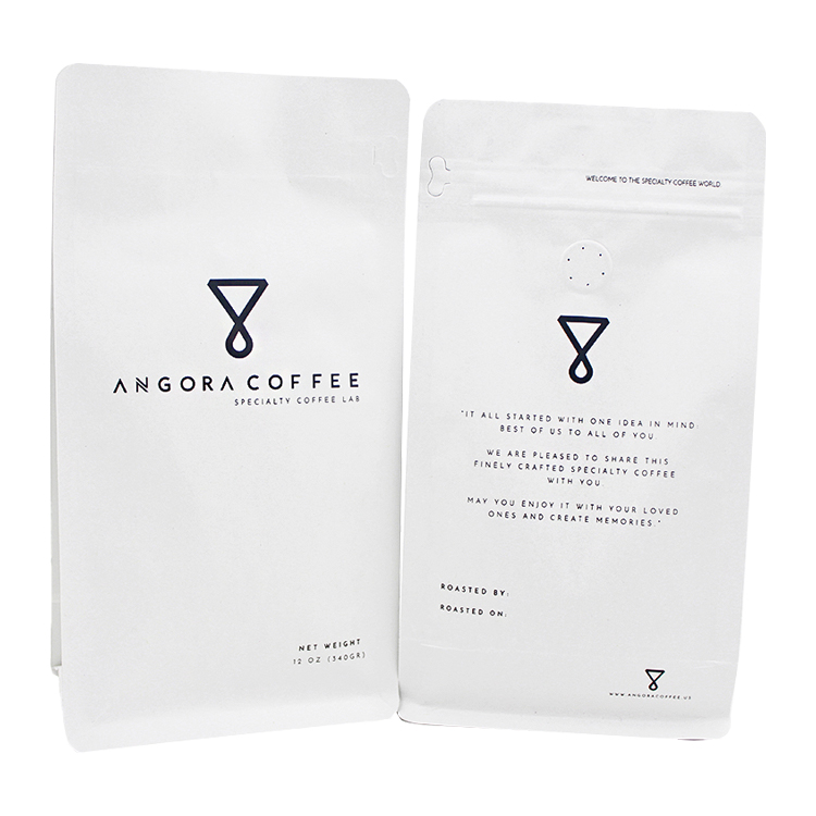 Two white coffee bag views with black printed branding