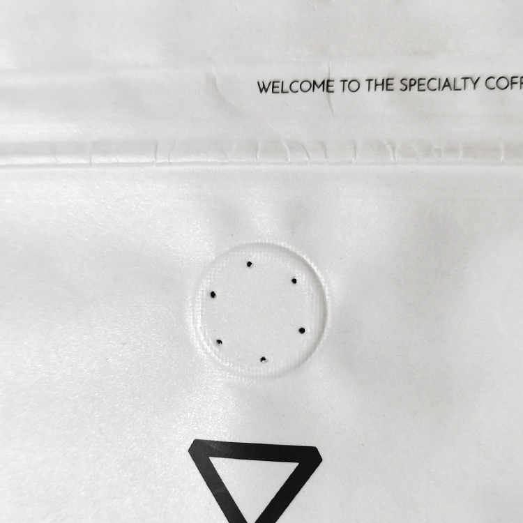 Close view of the valve above a black geometric mark