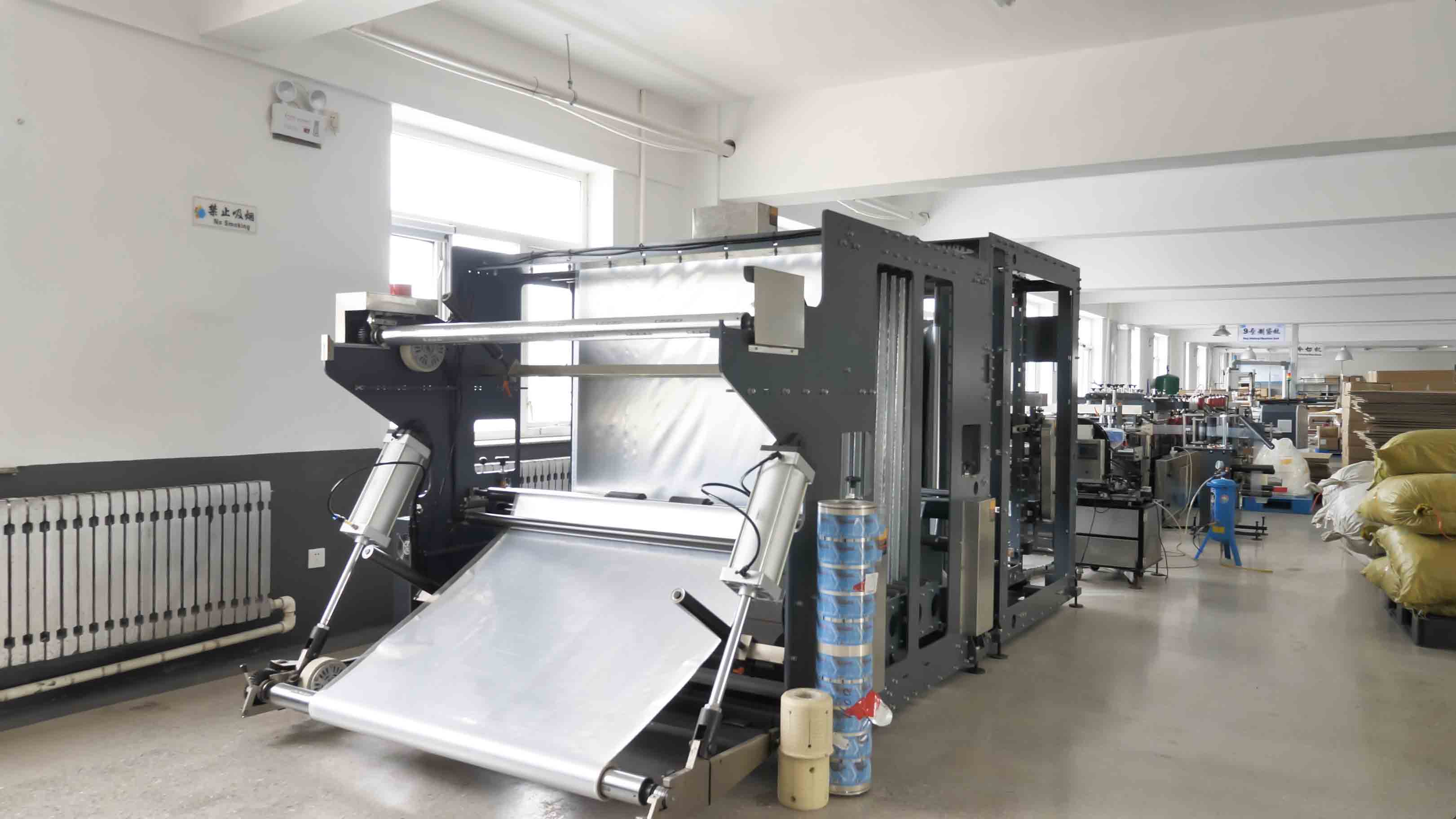 Film and the output area of a packaging converting machine