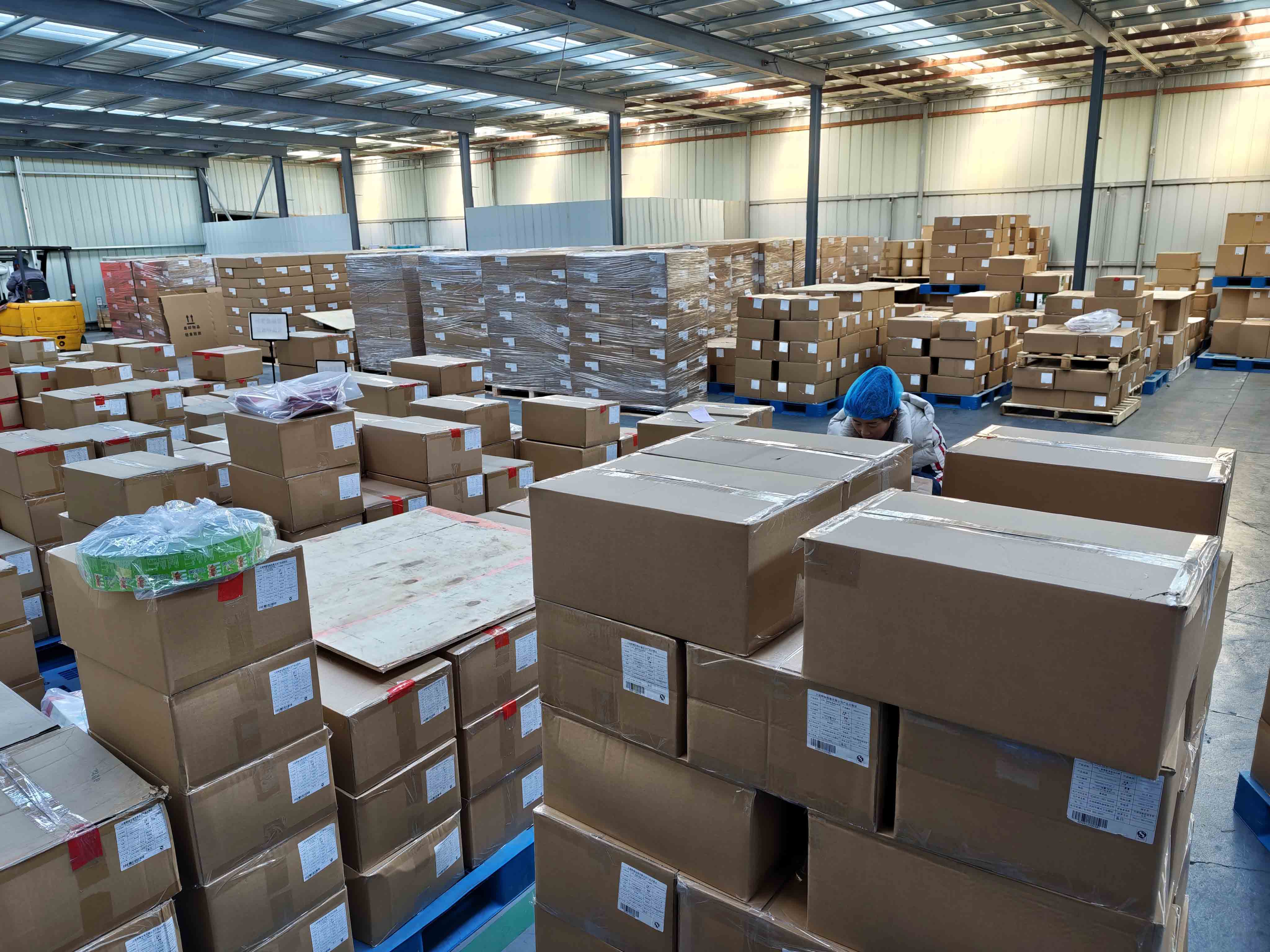 Packed cartons and pallets in the finished-goods warehouse