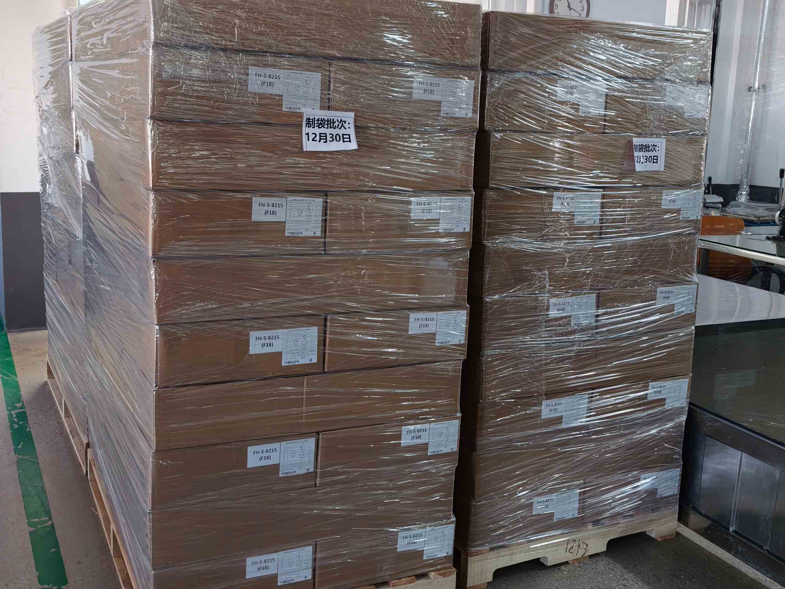 Wrapped cartons stacked on a pallet