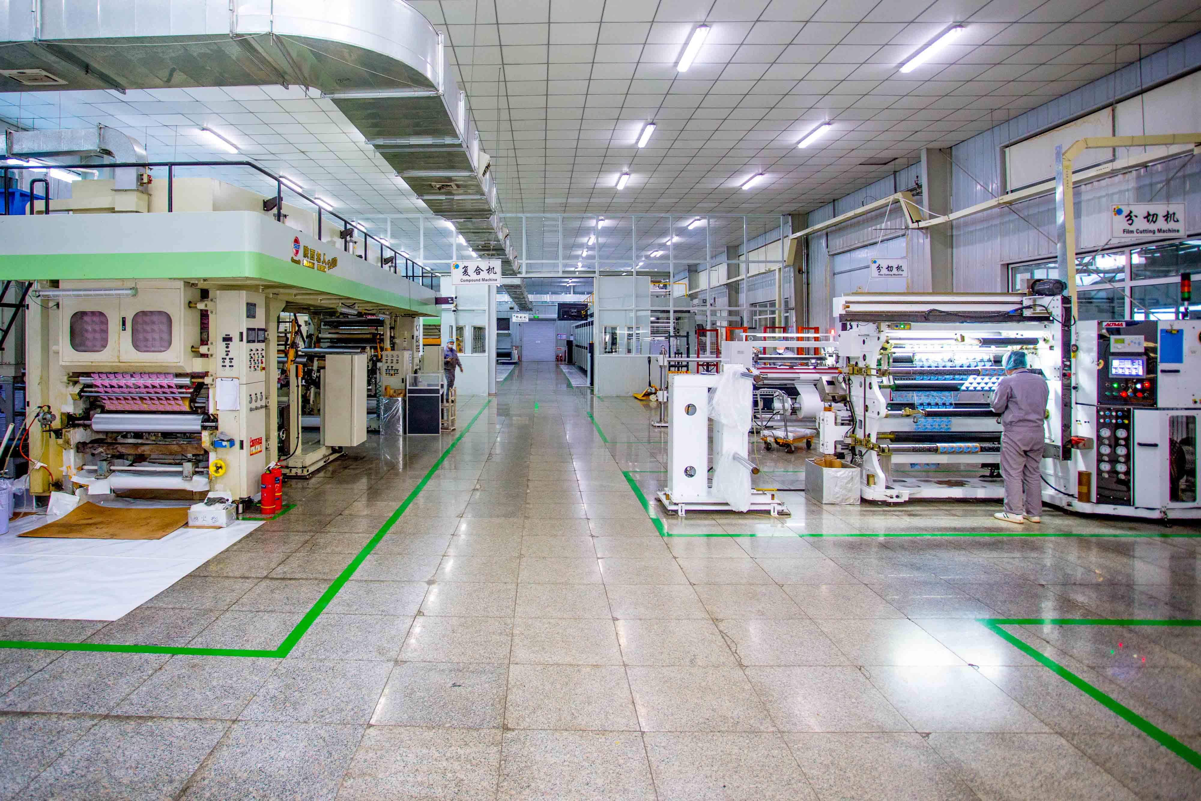 Flexible packaging production workshop with converting machinery